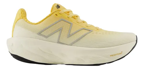 Tênis de corrida New Balance Fresh Foam X 1080 V14 feminino, com vista lateral do tênis, destacando a espuma Fresh Foam X na entressola